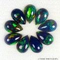 Opale czarne 4.07 ct kamienie naturalne 9 sztuk