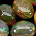 Opale ogniste 4.78 ct kamienie naturalne 8 sztuk