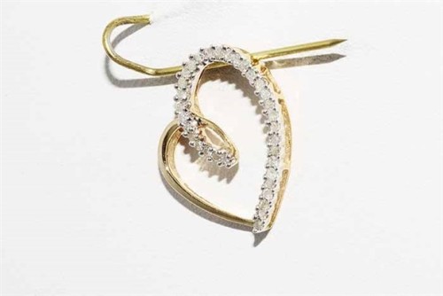 Złoty wisiorek naturalne diamenty 0.15 ct serce