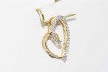 Złoty wisiorek naturalne diamenty 0.15 ct serce