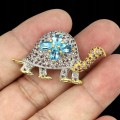 Srebrna broszka żółw szafiry swiss blue topazy 925