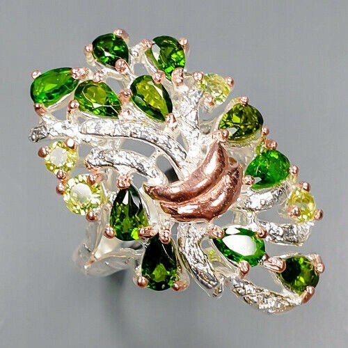 Artistic ring size 14.5 peridot diopsides