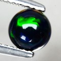 Opal czarny kamień naturalny 0.68ct AAA