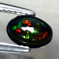 Opal czarny kamień naturalny 0.63ct AAA